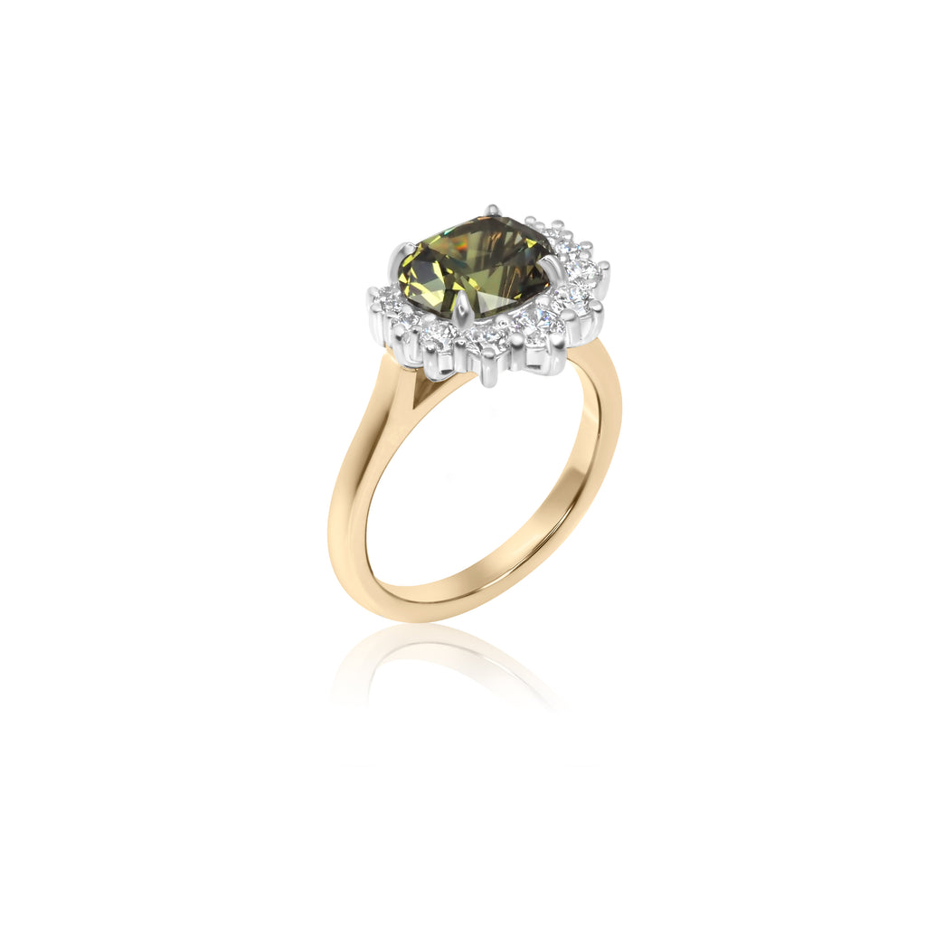 Gold ring with a large oval green Australian sapphire gemstone surrounded by small diamonds on a white background.