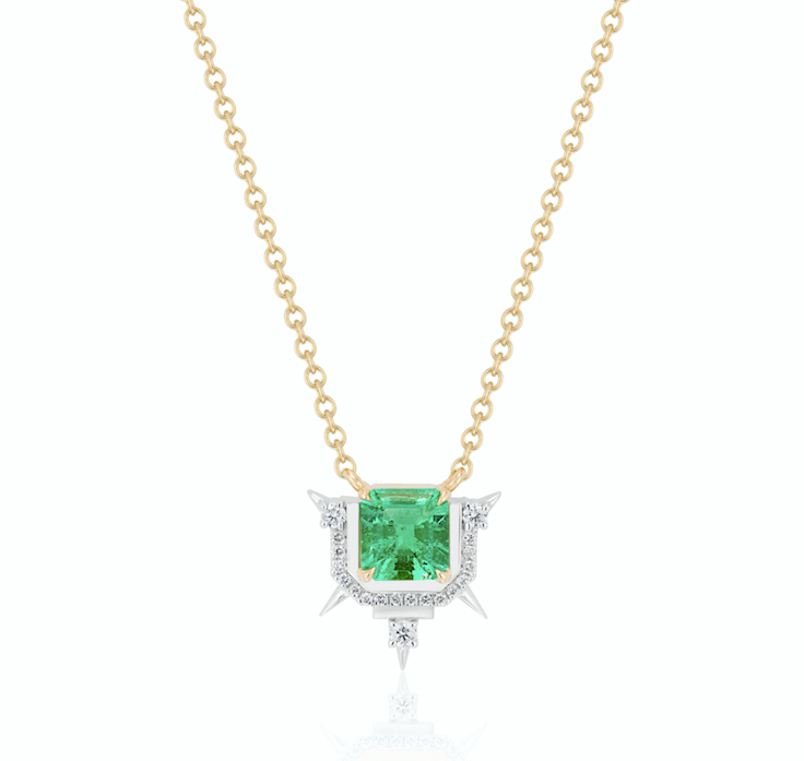 A gold chain necklace with a central square emerald pendant surrounded by diamonds.