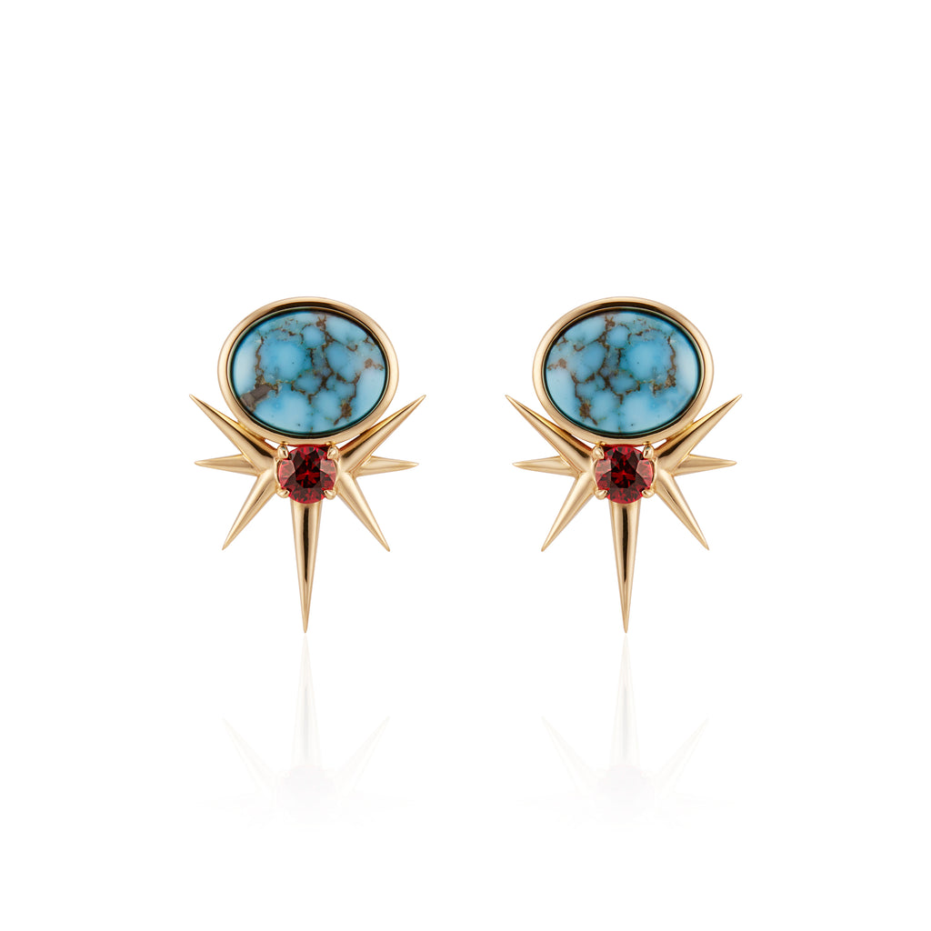 Gold starburst earrings with turquoise center and blood orange color sapphire stone detail.